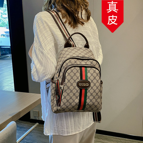 香港品牌真皮新款单肩背包双肩包