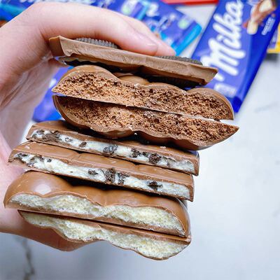 德国MILKA/妙卡果仁巧克力黑气泡牛奶夹心奥利奥排块进口网红零食