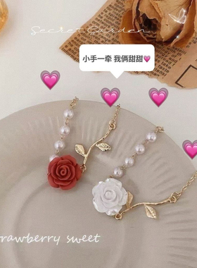 婚礼手腕花红玫瑰与白玫瑰珍珠