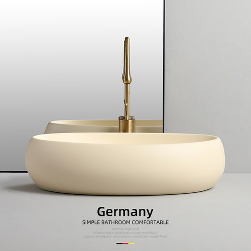 酒店卫生间椭圆形陶瓷洗手盆池奶油风民宿台上盆洗脸盆家用面漱盆