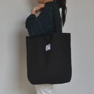 加厚大容量拉链帆布包休闲单肩包简约女包托特包黑色慵懒风购物袋