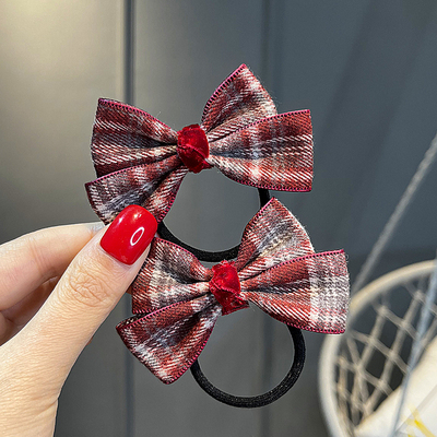 英伦风女孩呢料格子蝴蝶结对夹