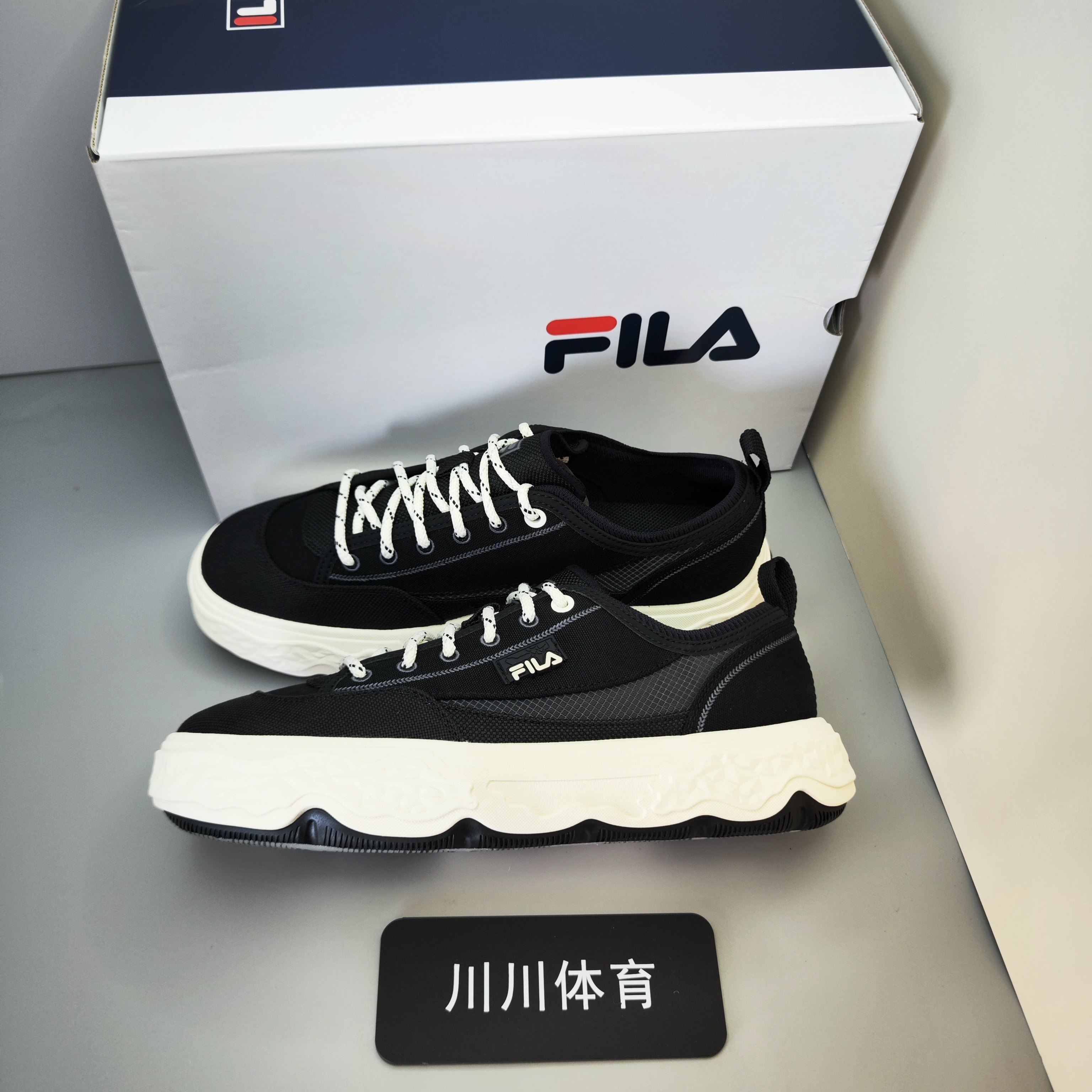 淘宝川川体育斐乐岩石Rock复古板鞋男款券后348元