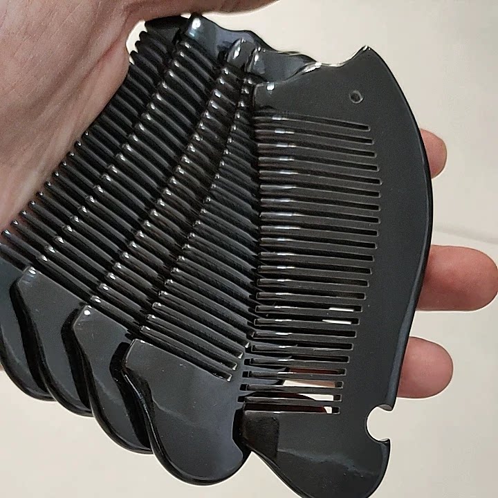 清仓牛角梳子小鱼型梳精品梳子