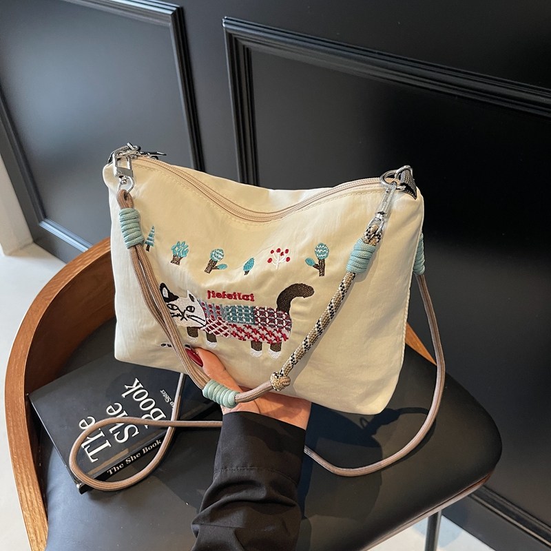 小众设计感刺绣猫咪帆布包轻便尼龙手提环保袋单肩腋下包斜挎包女