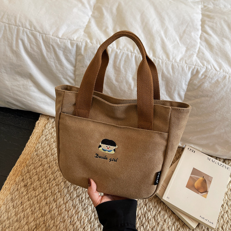 韩系可爱刺绣小女孩通勤帆布手拎水桶包日常杂物包便携学生饭盒包,箱包皮具/热销女包/男包,托特包,淘宝优惠券,粉丝福利购,淘宝优惠卷