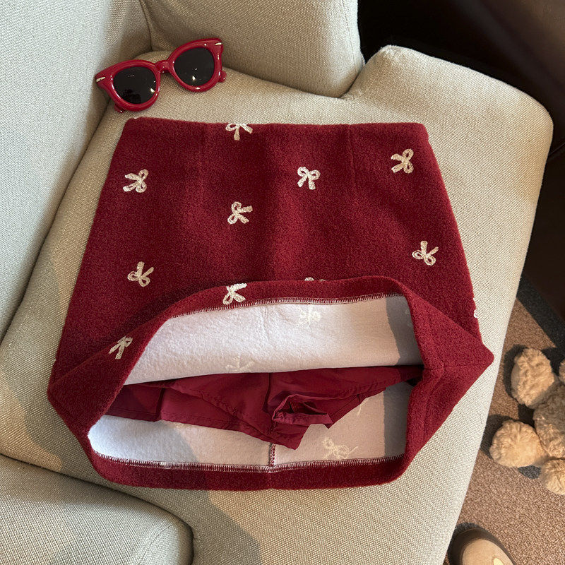 新年红色蝴蝶结毛呢半身裙女秋冬加厚甜美小个子包臀显瘦A字短裙