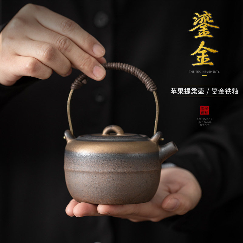 中式粗陶苹果提梁茶壶