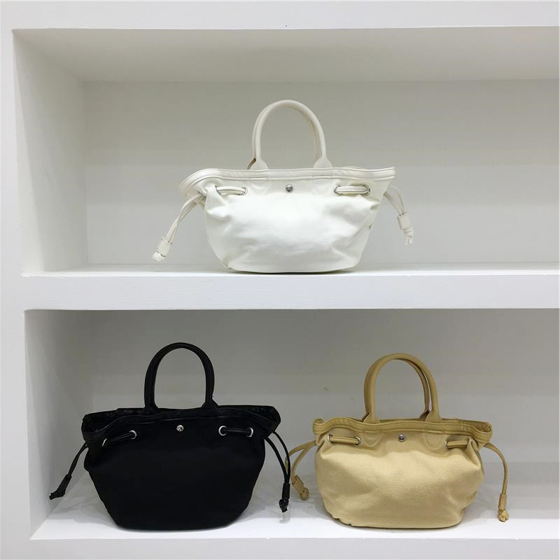 小脏柜 2025夏季新款韩国百搭休闲帆布抽绳帆布包手提水桶托特包,箱包皮具/热销女包/男包,通用款女包,淘宝优惠券,粉丝福利购,淘宝优惠卷