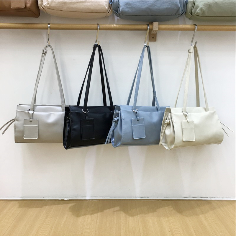 小脏柜 2025新款韩国小众高级感夏季简约手提通勤单肩腋下法棍包