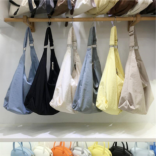 韩版 慵懒风轻便休闲大容量单肩斜挎尼龙布饺子包 2026新款 小脏柜