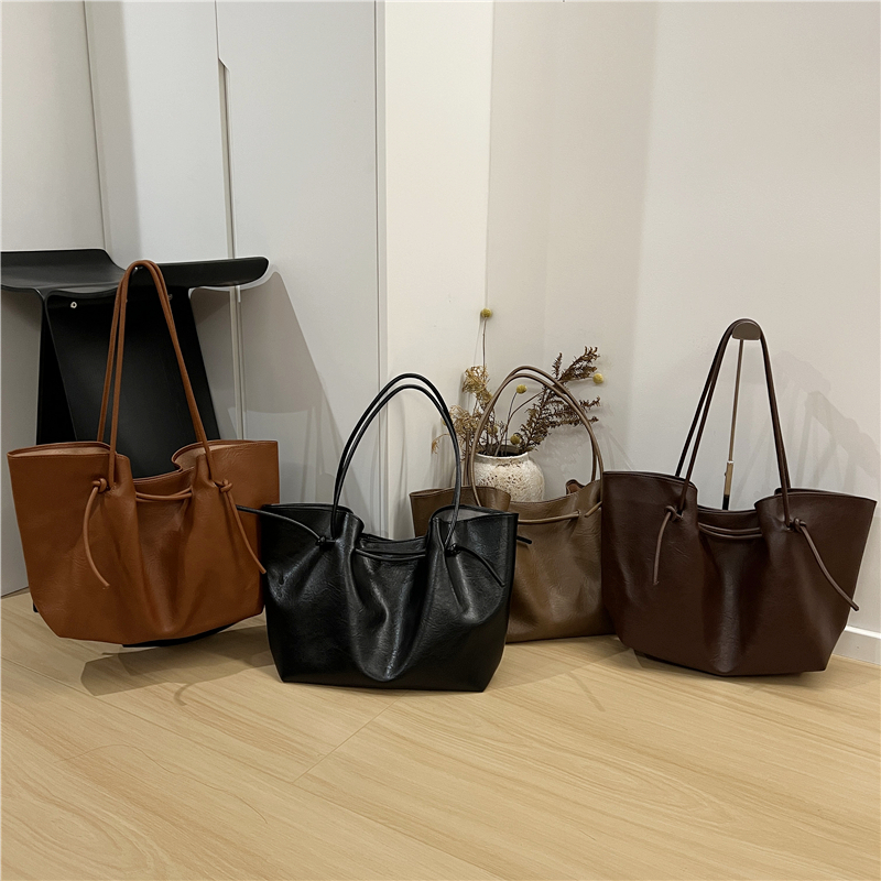 小脏柜 时尚串带绑结设计大容量单肩包新款通勤复古气质托特大包