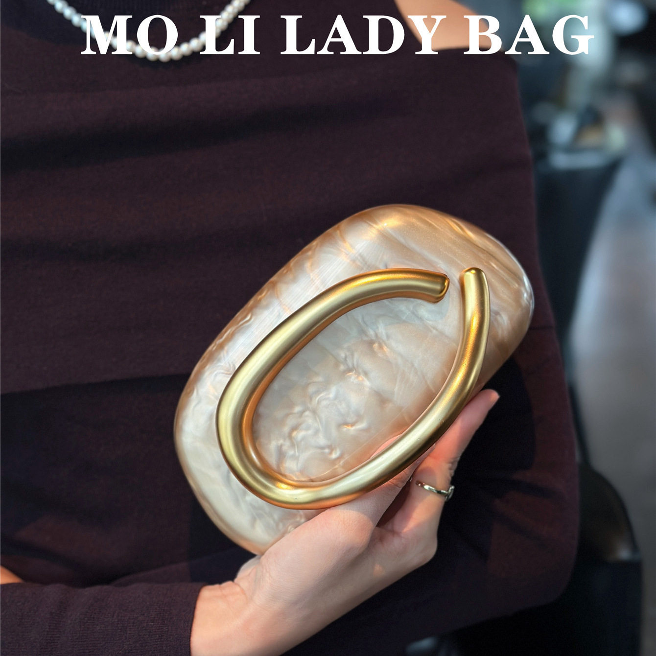 小众设计2025异型贝壳亚克力手拿包手机口红包斜挎包女生百搭包