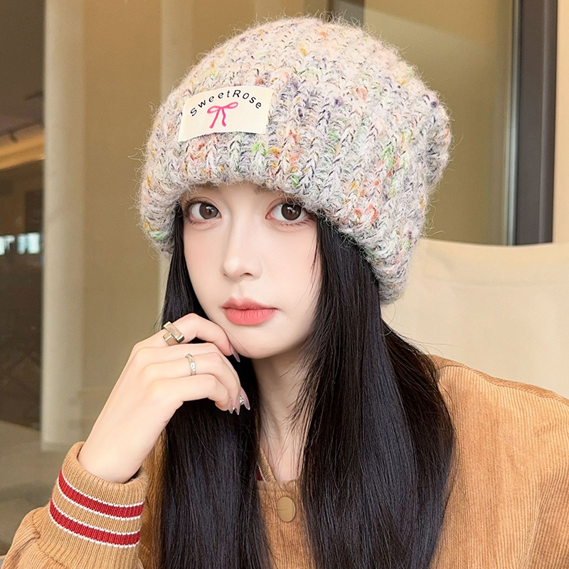 布标蝴蝶结毛线帽女秋冬厂家直销