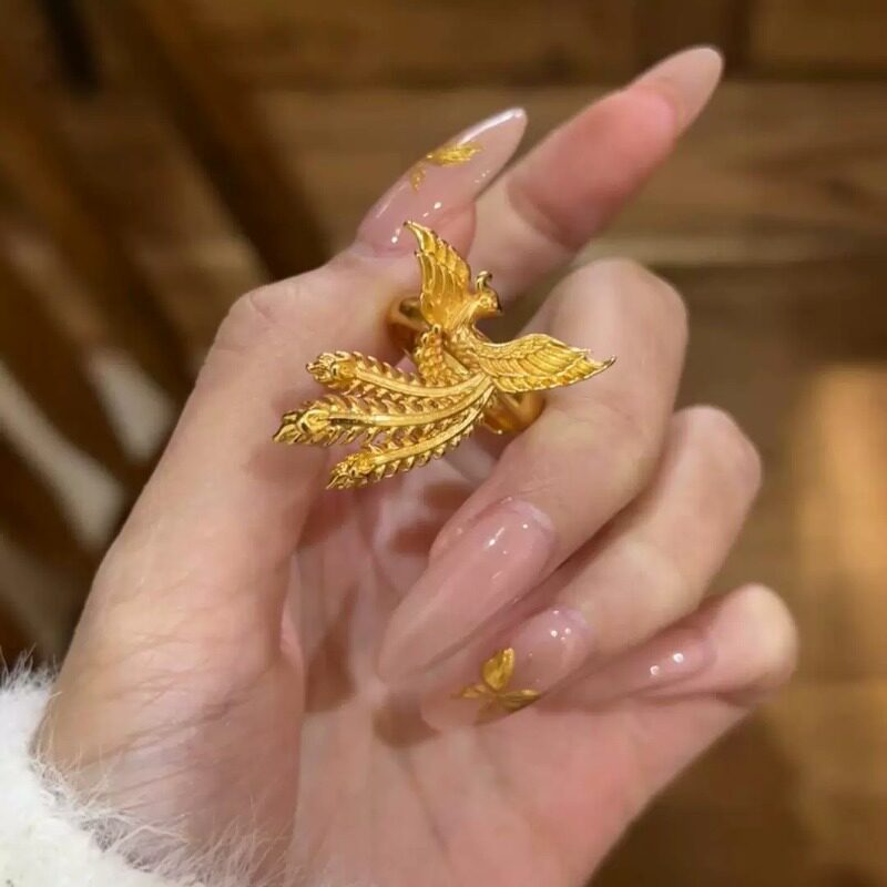 黄金色凤凰孔雀可调节婚戒对戒图片