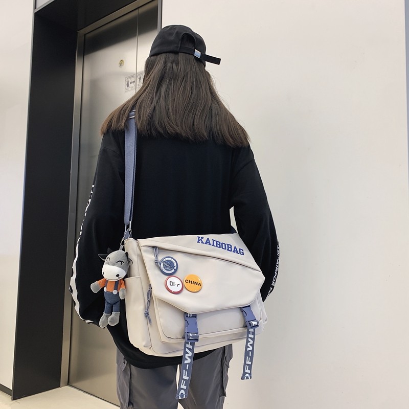 街头潮酷斜挎包男森系大容量帆布单肩包新款时尚学生上课邮差包女,箱包皮具/热销女包/男包,时尚帆布包,淘宝优惠券,粉丝福利购,淘宝优惠卷