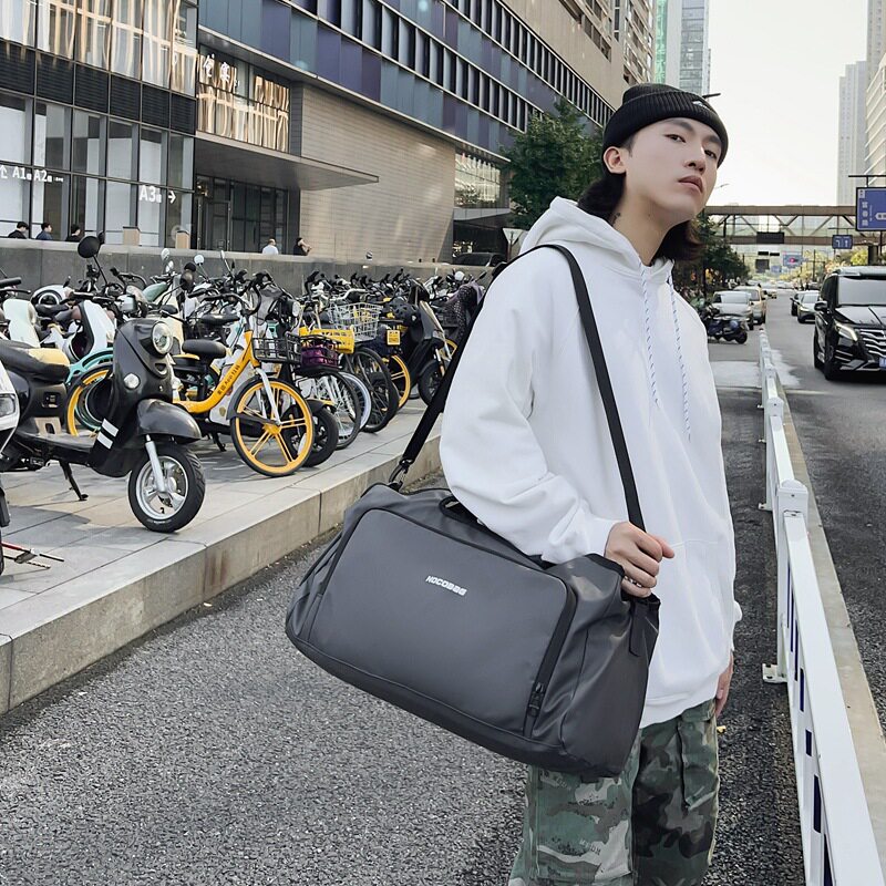 简约时尚手提旅行包男斜挎运动健身包男款大容量外出旅游行李包女