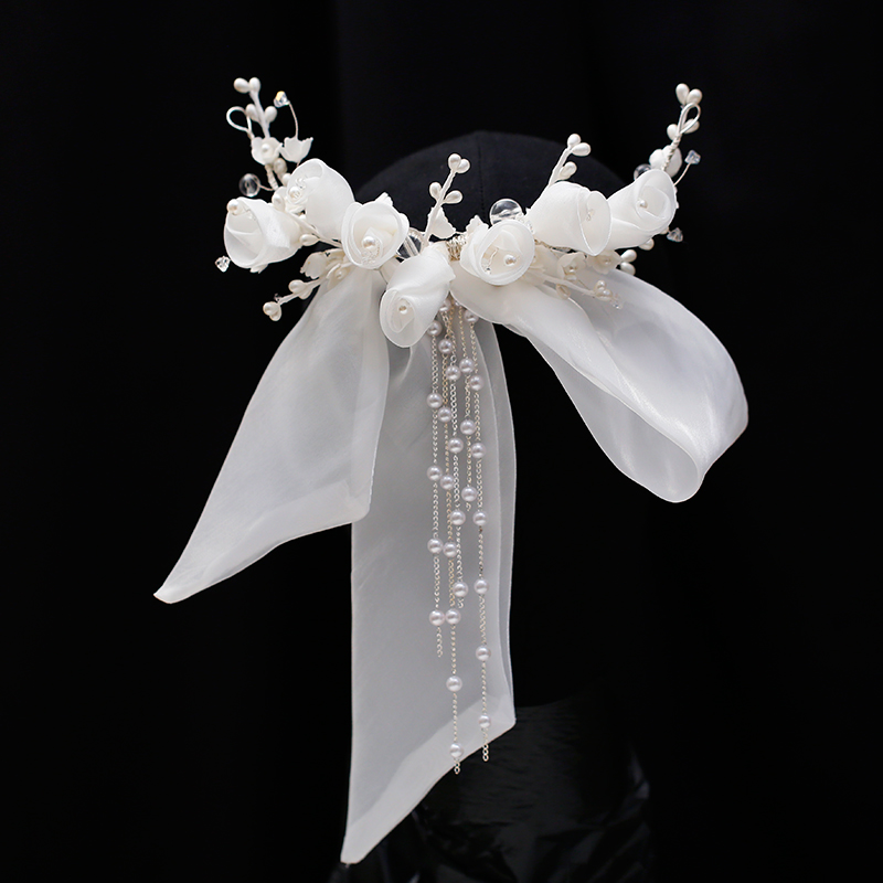 唯美白色欧根纱花苞蝴蝶结头饰后区造型新娘结婚礼服森系外景配饰