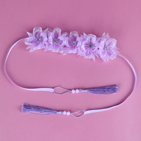 Сиреневая повязка на голову с кисточками