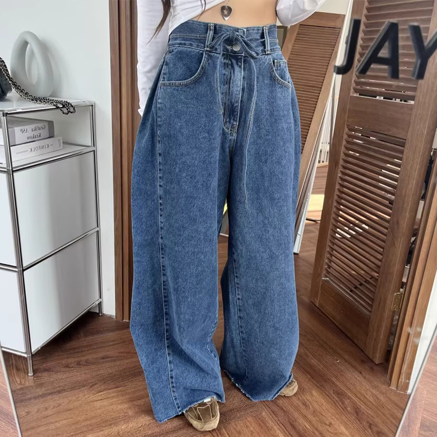 侧边压褶拼接毛边牛仔裤长裤