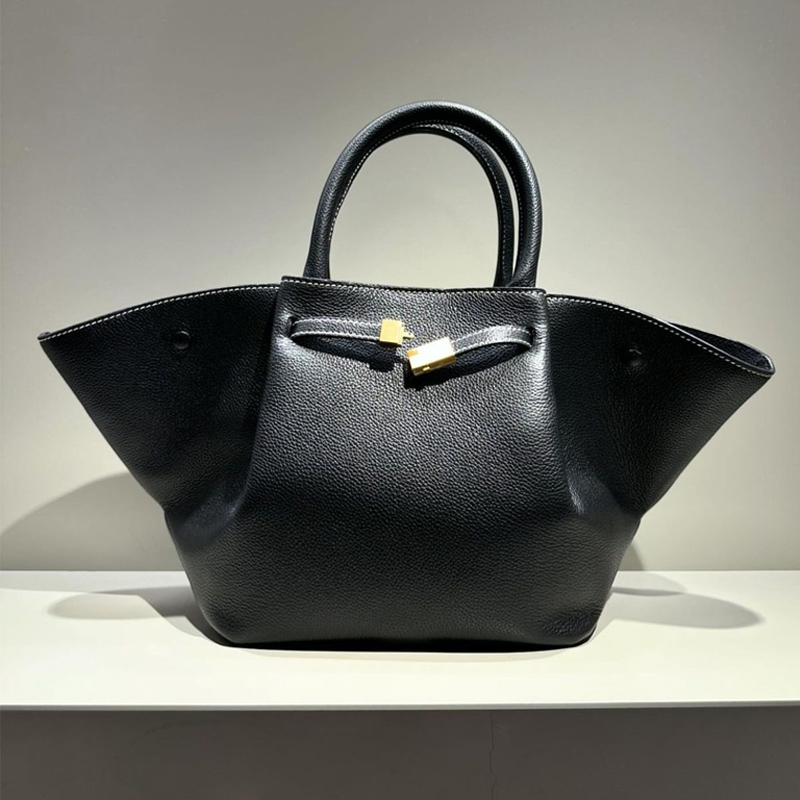 翅膀形大容量托特包2025新款欧美复古皮带扣通勤手提单肩斜挎包