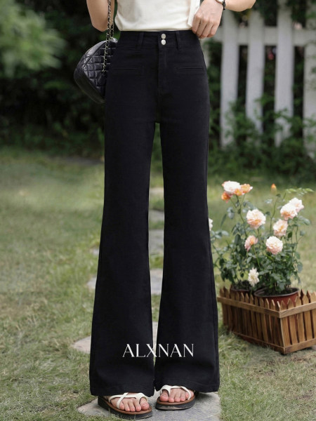 Black high-waisted wide-leg pants worn by a model outdoors