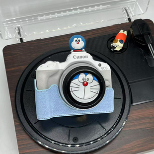 佳能R50保护套R10相机包r100半包底座R8/RP皮套r6/r6二代壳r5配件