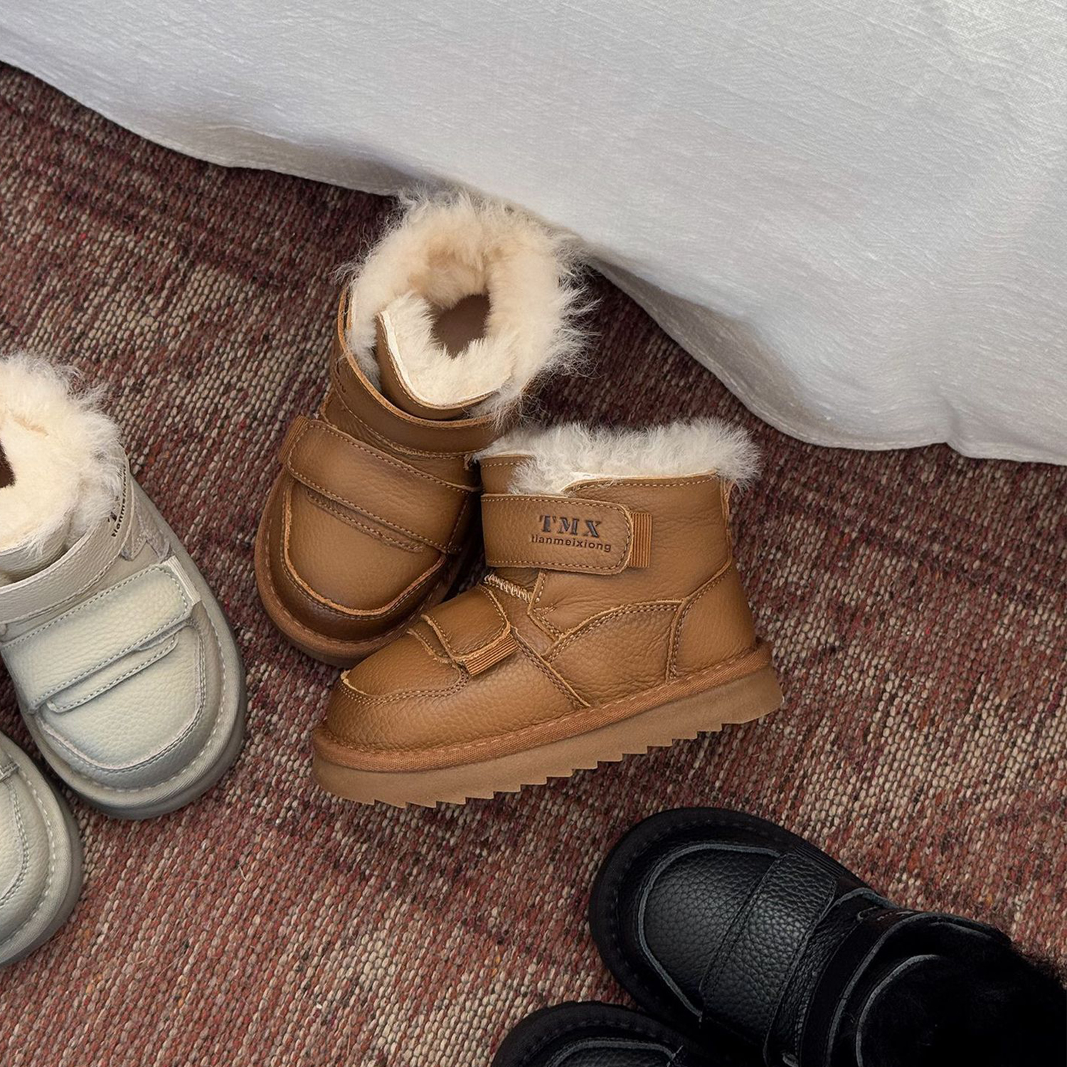 儿童雪地靴皮毛一体加厚大棉靴子