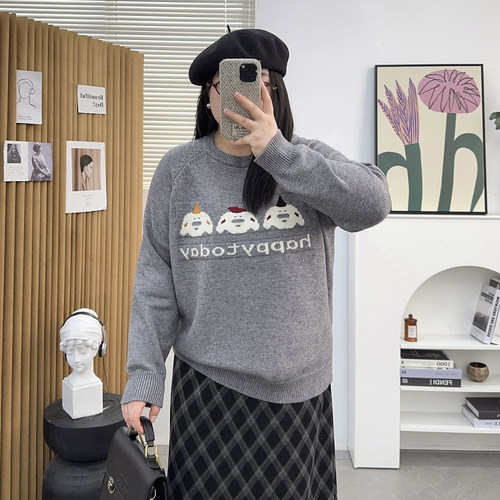 圆领插肩袖提花卡通毛衣