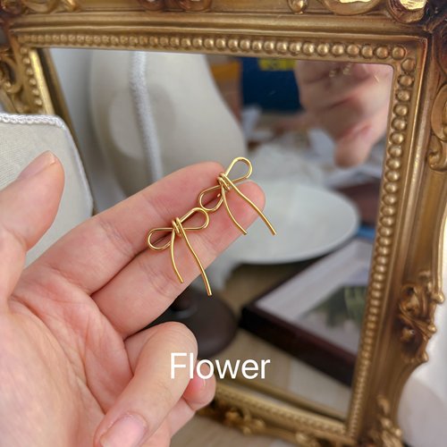 金色绳结蝴蝶结通体钛钢耳环女简约气质高级感显脸小百搭独特耳饰