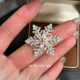 suzyacc kr超闪合成锆石微镶旋转雪花胸针轻奢气质百搭高级感徽章