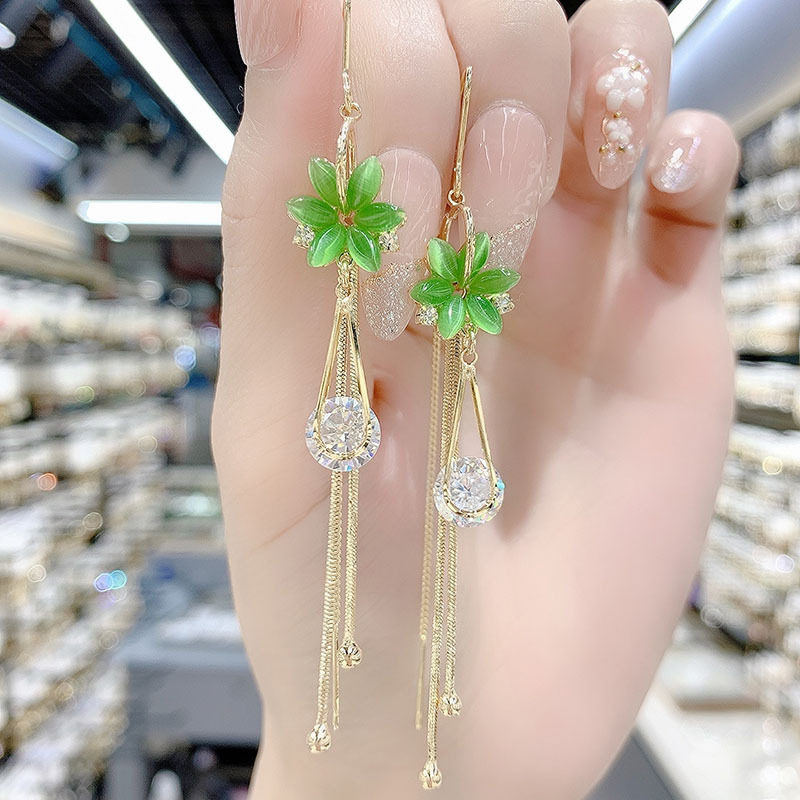 德国高级感超闪绿色猫眼石花朵耳线年新款潮气质时尚长款防丢耳饰