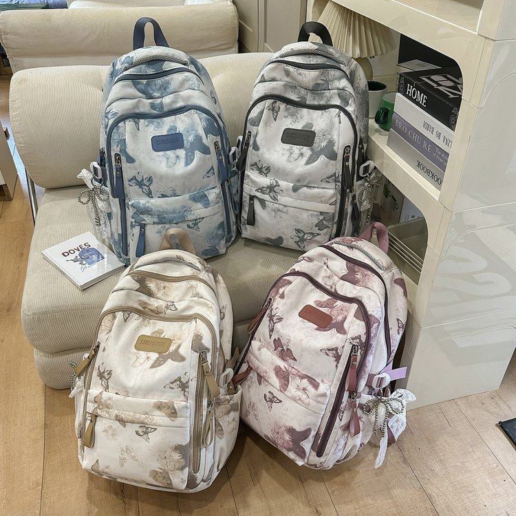 扎染蝴蝶书包初中女生高颜值大容量小学生女孩轻便高中生双肩包女,箱包皮具/热销女包/男包,双肩背包,淘宝优惠券,粉丝福利购,淘宝优惠卷