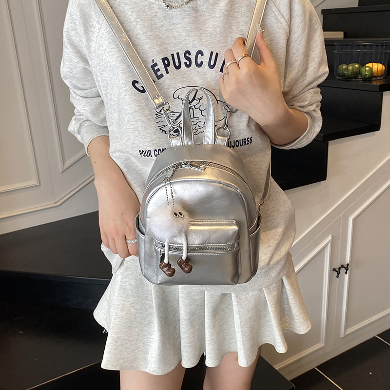 红鹮鸟2026新款百搭通勤小众学院风时尚潮流纯色手提双肩背