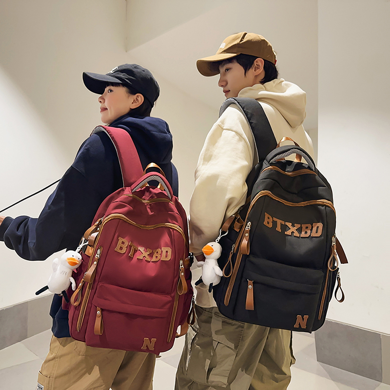 轻便双肩包女旅游新款时尚登山包大学生大容量旅行背包男款书包