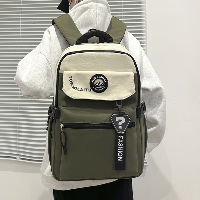 红鹮鸟书包男初中生小学生大容量2026女撞色简约高中生双肩包