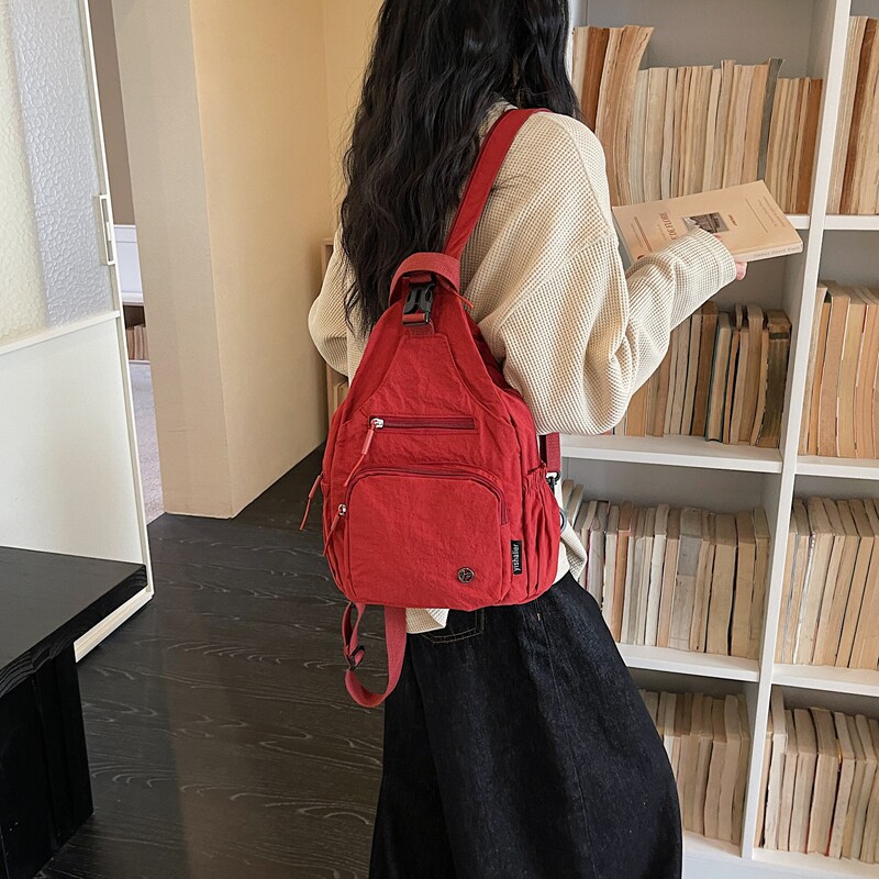 红鹮鸟迷你通勤女双肩包
