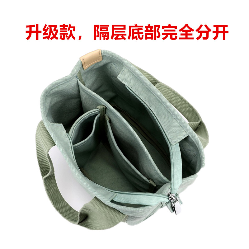 新款手提斜挎实用小包多隔断帆布包宝妈妈包饭盒手机水杯休闲女包