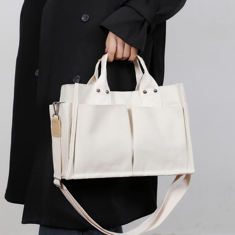 手提帆布包新款简约多兜韩版OL斜挎单肩女包学生书包时尚公文包女