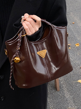 高级感手拎包包女式2025年夏季流行通勤单肩包大容量托特包斜挎包