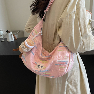 日常通勤百搭包包女式2026新款潮时尚复古单肩包大容量斜挎饺子包