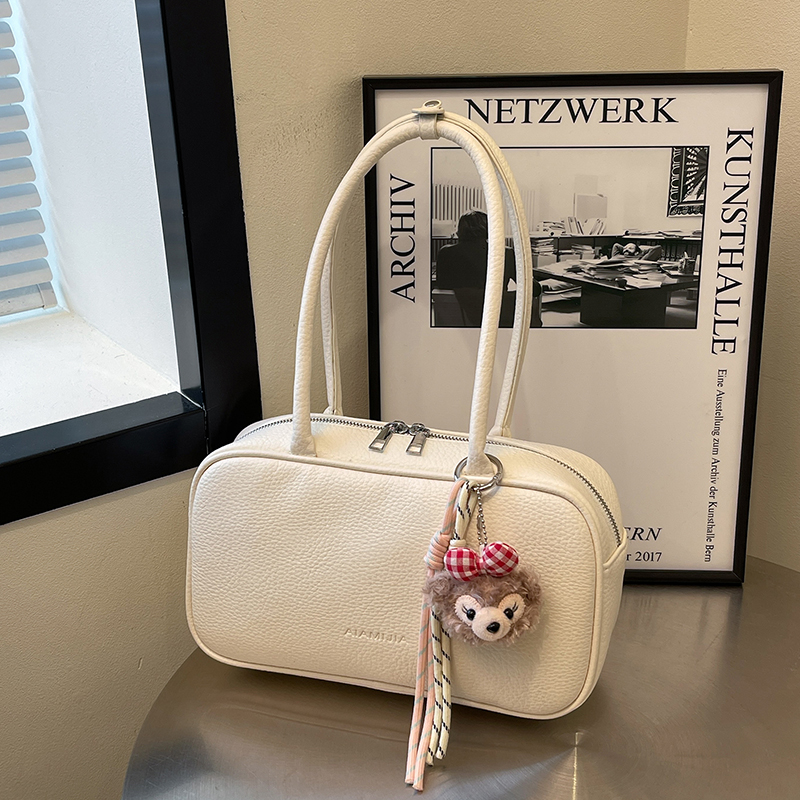 保龄球包包女款2025新款流行时尚高级感单肩包复古简约通勤手提包