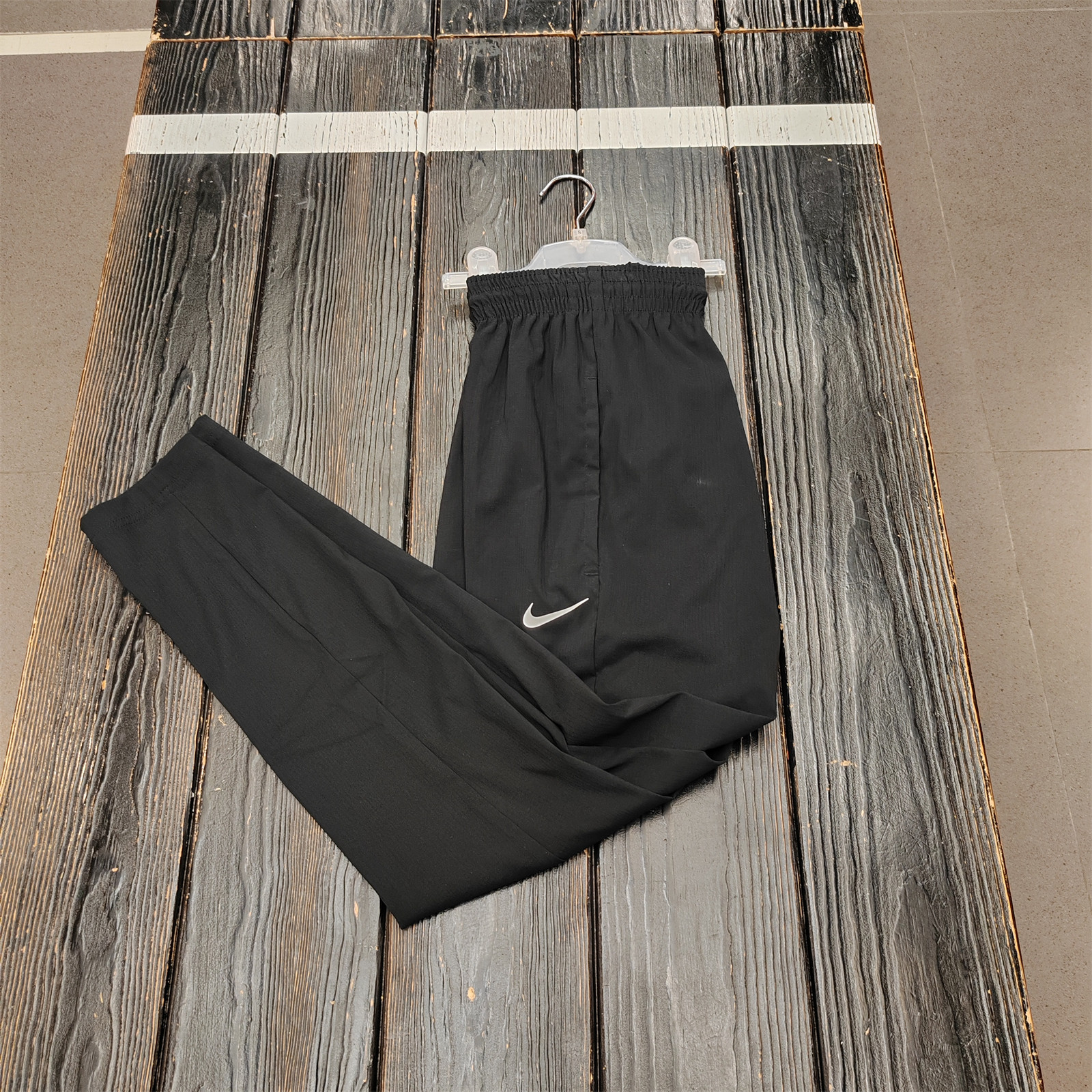 耐克NIKE奥莱正品男运动休闲训练篮球跑步梭织速干收腿长裤CV1991