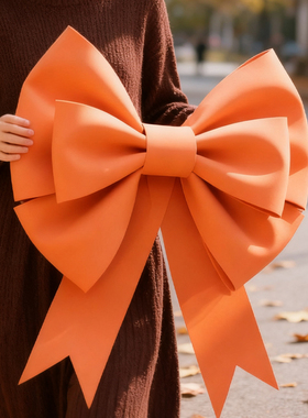 橙色蝴蝶结装饰墙上大号新年氛围场景布置生日拍照道具服装店挂饰