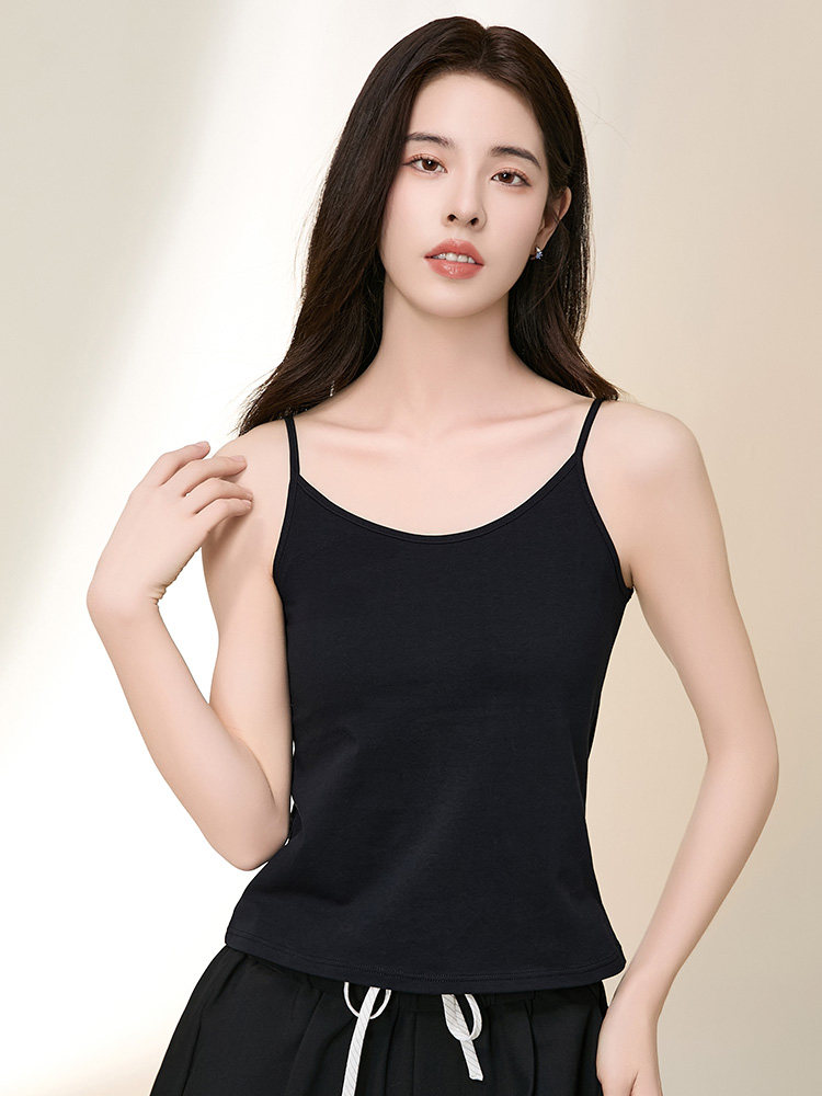 Black spaghetti-strap tank top worn by a model