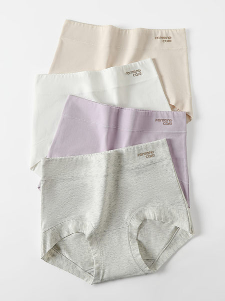 Flat lay of four women’s seamless underwear briefs in neutral and pastel colors