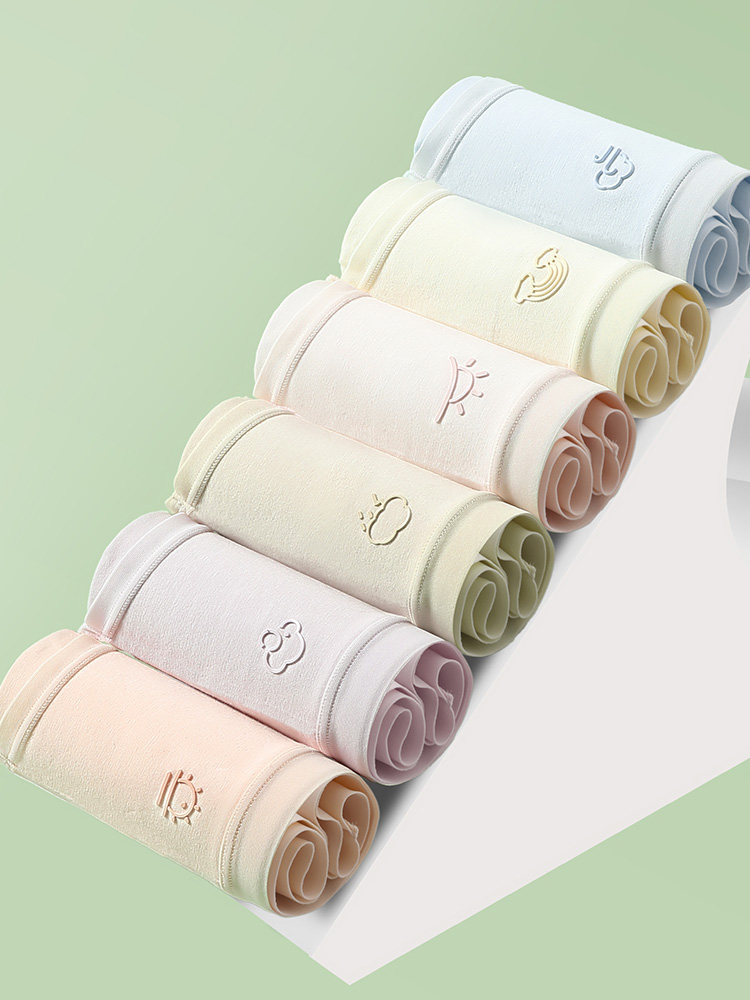 Pastel rolled underwear or shorts displayed on a white surface