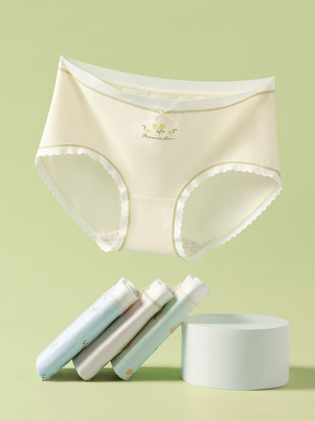 Cream-colored women's underwear briefs displayed on a pastel background