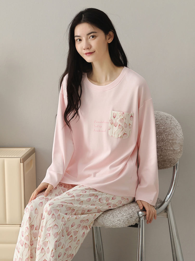 Model wearing a pink floral long-sleeve pajama set