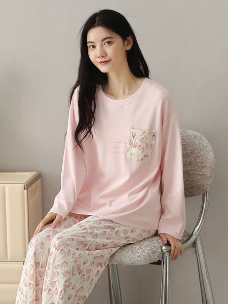 Model wearing a pink floral long-sleeve pajama set